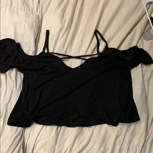 Strap of tank top off shoulder